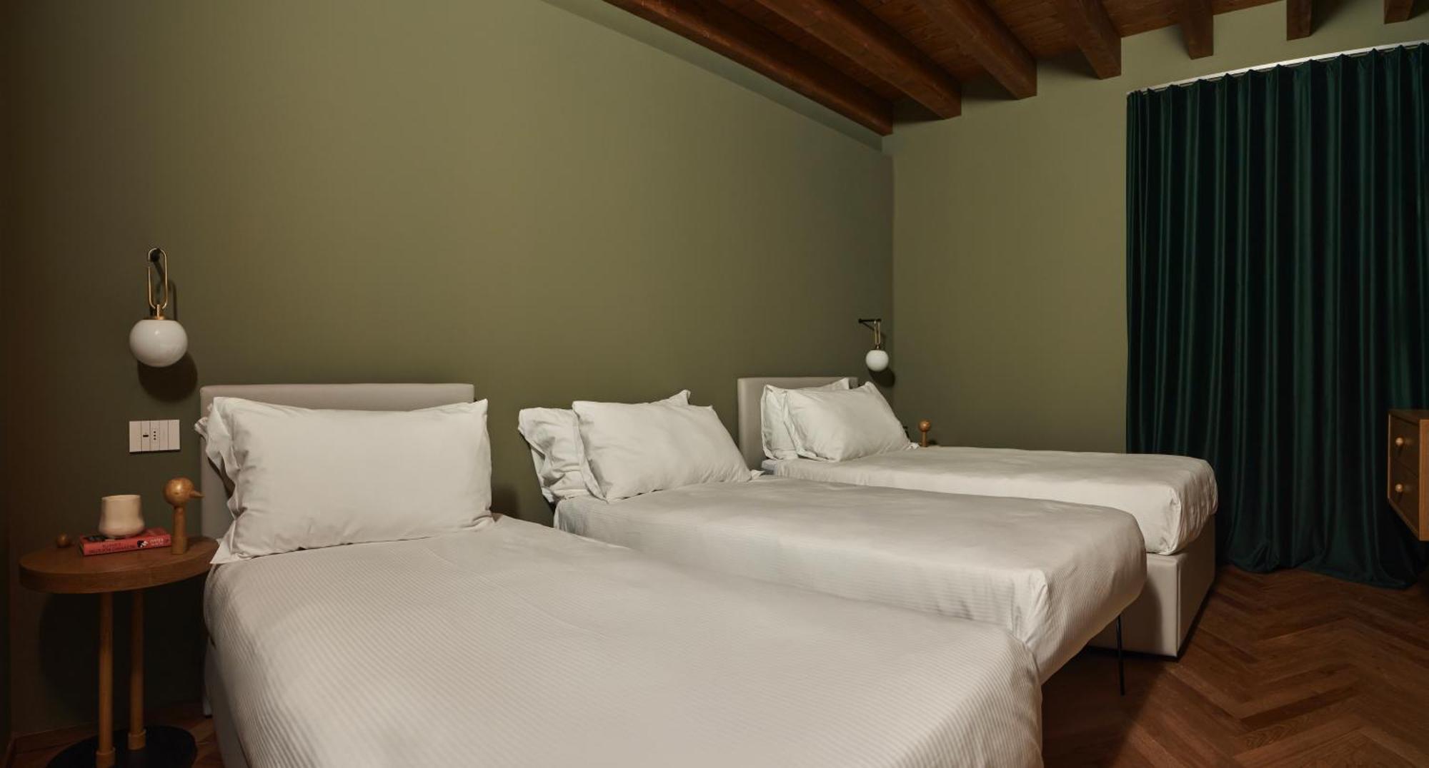 Rego Apartments - Boutique Aparthotel & Serenity Spa With Some Off-Site Apartments In The Heart Of Bergamo City Center Δωμάτιο φωτογραφία